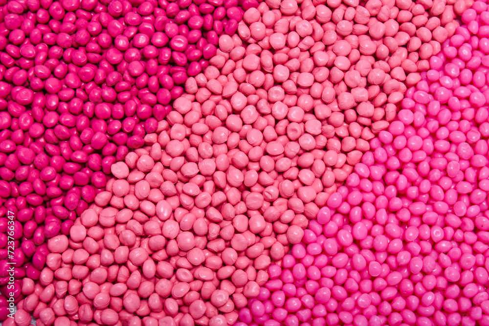 masterbatch granules in three kinds of pink colors, this polymer is a colorant for products in the plastics industry masterbatch granules in three kinds of pink colors, this polymer is a colorant for products in the plastics industry