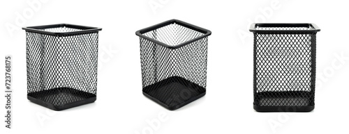 Isolated group of black metal pen holder standing on white background. Square shape empty pen school container pencil. photo