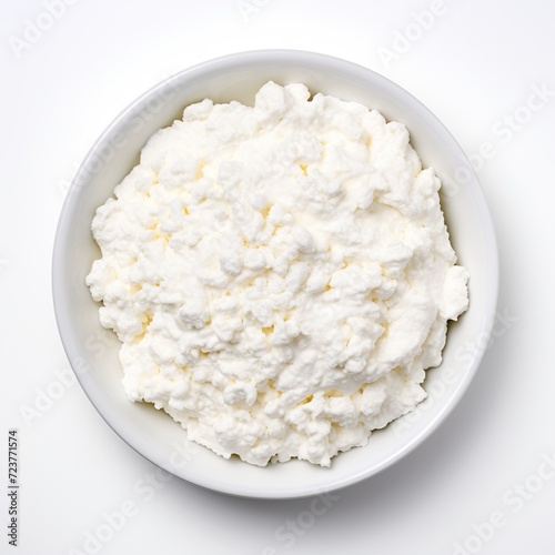 Cottage cheese white plate top view solated on white background