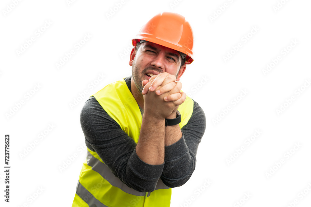 Desperate builder man begging with hands together Desperate builder man begging with hands together