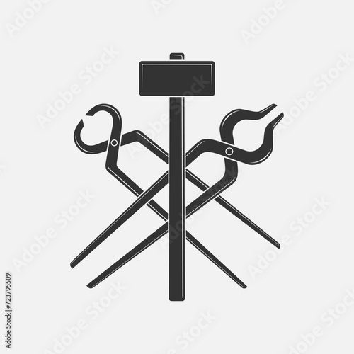 Blacksmith tools graphic sign. Smithy symbol. Forging tools sign isolated on white background. Vector illustration