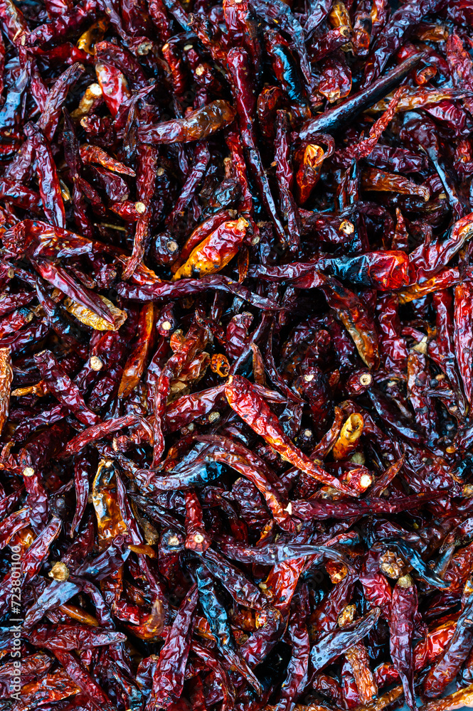 chilies Red and black roasted dried chilies.red dried chili Bring it to roast with low fire until fragrant and blended. called cayenne pepper chilies Red and black roasted dried chilies.red dried chili Bring it to roast with low fire until fragrant and blended. called cayenne pepper