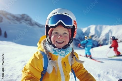 A young child dressed in a yellow jacket and goggles is pictured on a ski slope. This image can be used to showcase winter activities and the joy of skiing