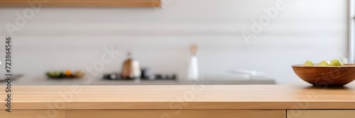 Blurry white light fills the empty room with a wooden interior  showcasing a modern window  food display  and design texture on the top counter. The wall space features a wooden tabletop  white.