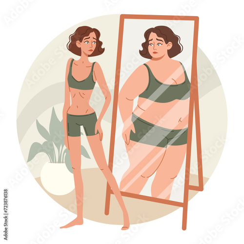  Anorexia, eating disorder. Sad young thin woman looks at her reflection in the mirror and sees herself overweight. 