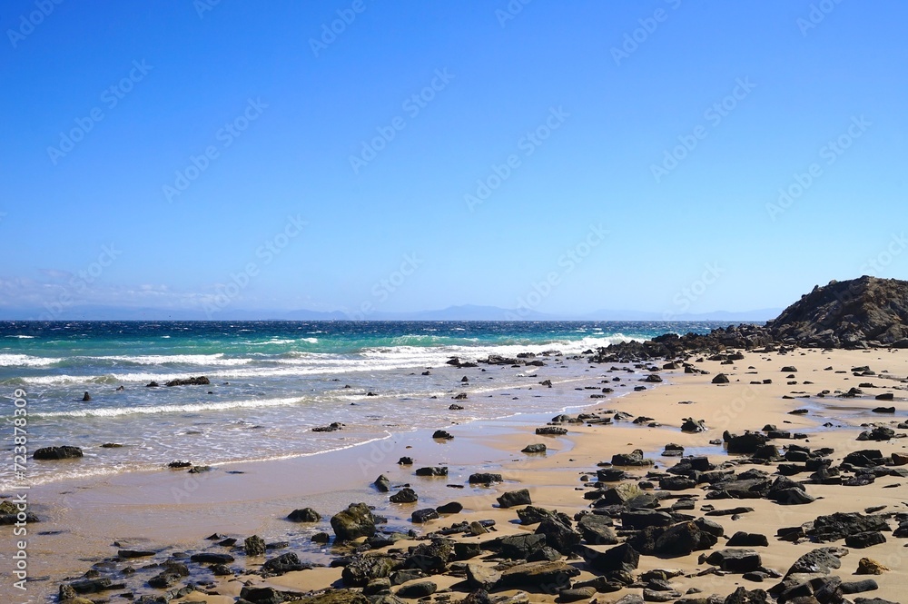 view of the beautiful coastline at the Punta Paloma beach with dunes and rocks near Valdevaqueros, Tarifa, Andalusia, province of Cádiz, Spain view of the beautiful coastline at the Punta Paloma beach with dunes and rocks near Valdevaqueros, Tarifa, Andalusia, province of Cádiz, Spain