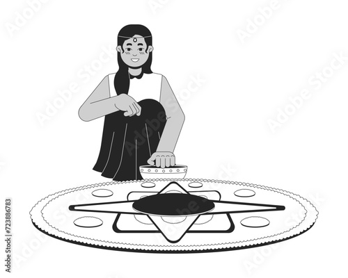Smiling indian young girl making kolam black and white 2D line cartoon character. South asian female isolated vector outline person. Hindu festival Deepawali monochromatic flat spot illustration