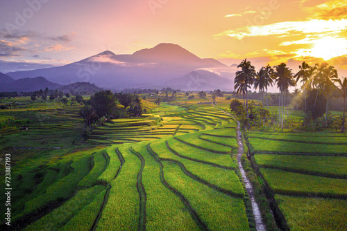 beautiful morning view from Indonesia of mountains and tropical forest © RahmadHimawan