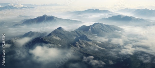 Panorama of mountains covered with clouds in the morning.