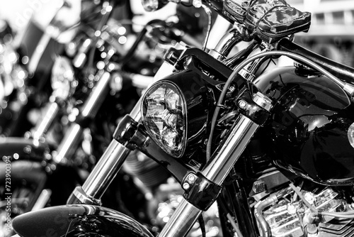 Detail of the headlight of a motorcycle. Black and white. © WeźTylkoSpójrz
