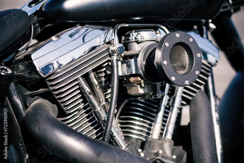 Closeup of a Royal Enfield motorcycle parked in the streets of Kathmandu in the afternoon