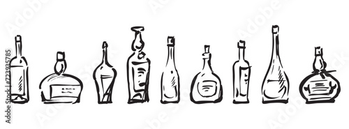 Contour hand drawings of set different wine bottles, vector sketches isolated on white