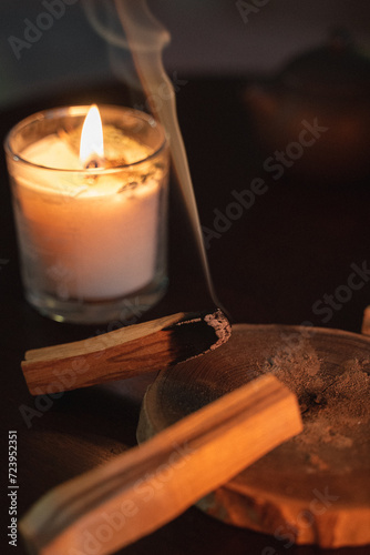 Candle and palo santo spiritual event photo