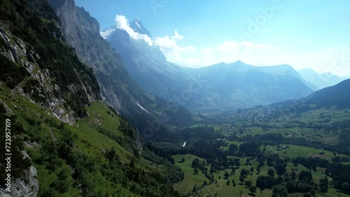 Aerial view of Grindelwald mountain peaks valley Bernese Oberland, Switzerland. Black Lütschine, Bernese Alps, Swiss Alps, Bern. 4k full hd drone video shooting