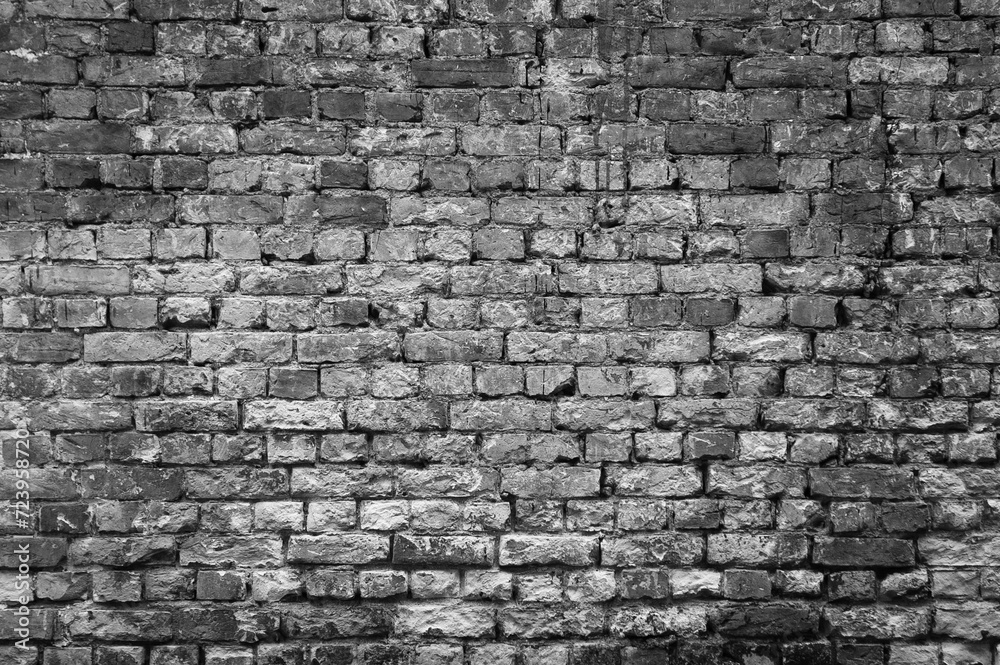 Fototapeta premium old brick wall close up in gray color