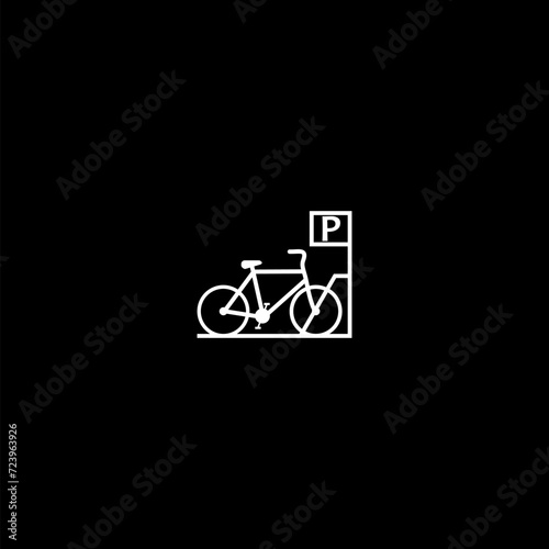 Bicycle parking with a bike icon isolated on dark background