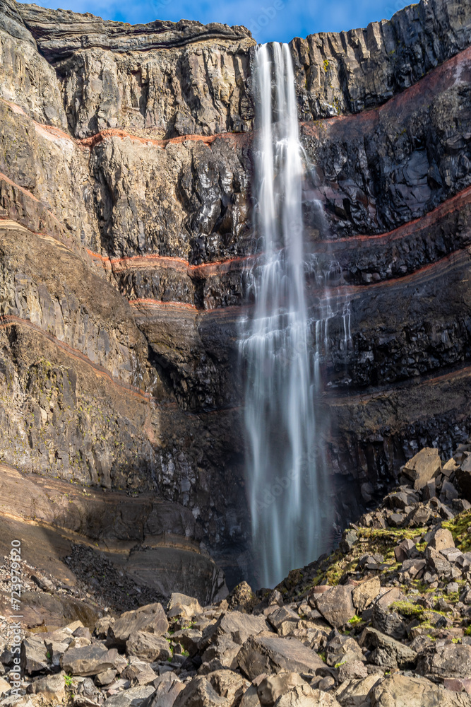 Fototapeta premium The Hengifoss waterfall with beautiful geological patterns. 