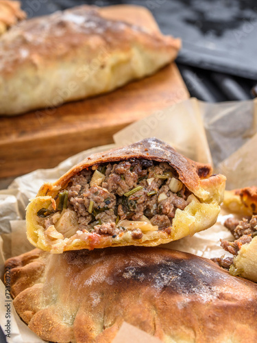 Close-Up of Homemade Fresh Beef Stuffed Empanada - Delicious 4K Ultra HD Image of Savory Pastry