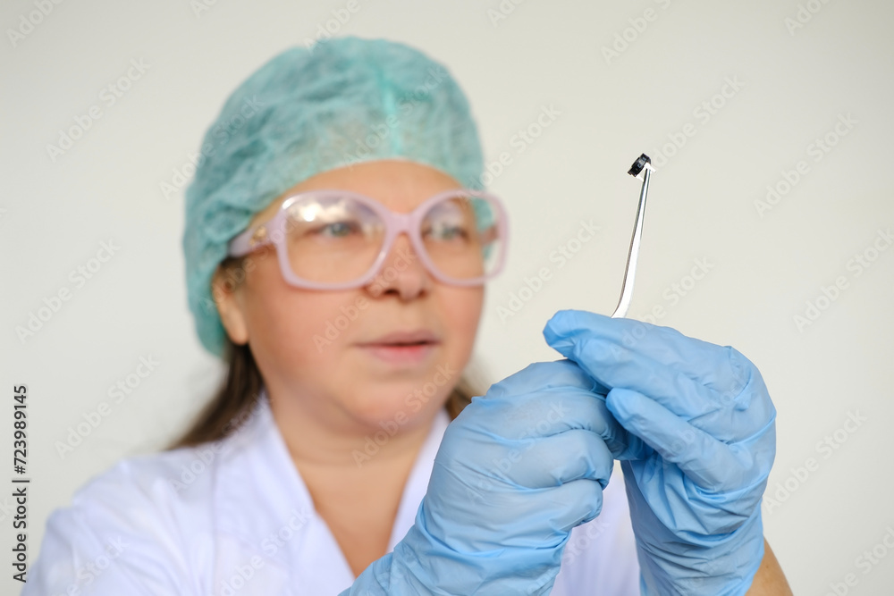 Electronic chip, bug in scientist's hand, Highlighting advancements in medical technology and neuroscience research, cognitive enhancement, Cybernetics and Human Enhancement Electronic chip, bug in scientist's hand, Highlighting advancements in medical technology and neuroscience research, cognitive enhancement, Cybernetics and Human Enhancement