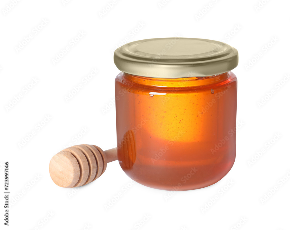 Tasty natural honey in glass jar and dipper isolated on white Tasty natural honey in glass jar and dipper isolated on white