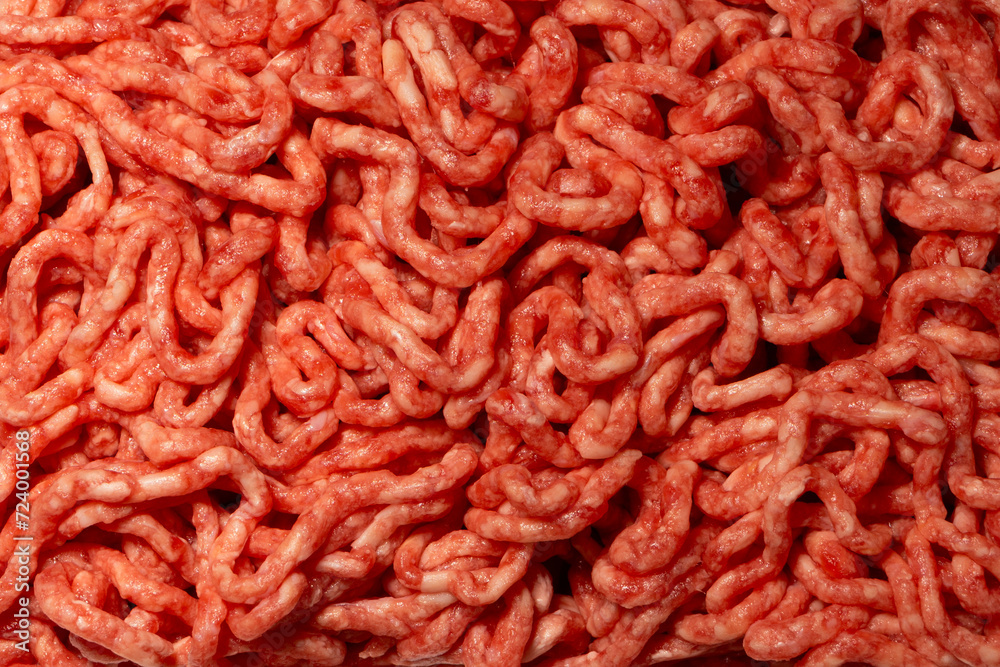Raw minced beef close-up, top view. Raw minced beef close-up, top view.