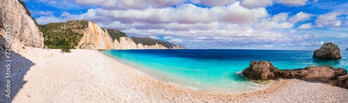 Greece best beaches of Ionian islands. Cephalonia (Kefalonia)- scenic desrted beach Fteris with tropical turquoise sea and white pebbles photo