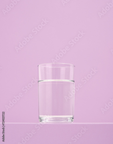 A glass cup with clean water. Health and treatment.