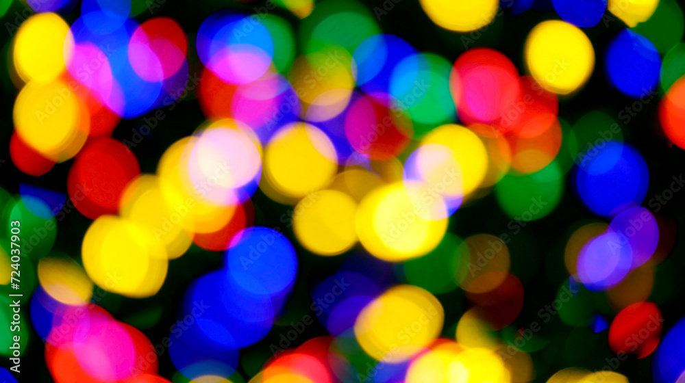 intentionally blurred background of many colorful lights of red yellow green uscsia blue colors ideal as abstract background