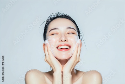 洗顔をする肌の綺麗な日本人女性（スキンケア・美肌・モデル） 