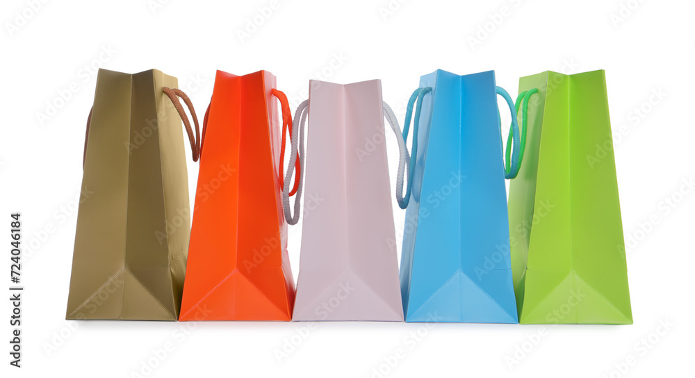 Colorful paper shopping bags isolated on white