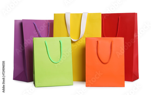 Colorful paper shopping bags isolated on white