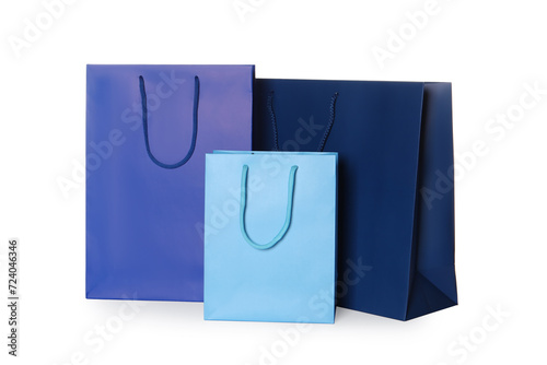 Blue paper shopping bags isolated on white