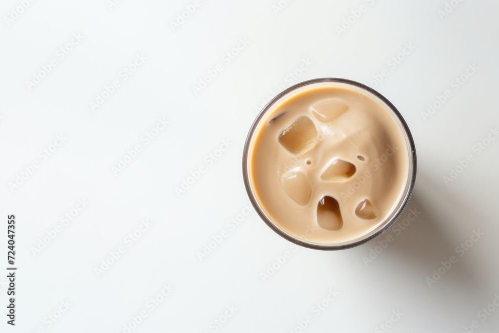 Obraz premium Top view of cold iced coffee on a white background.