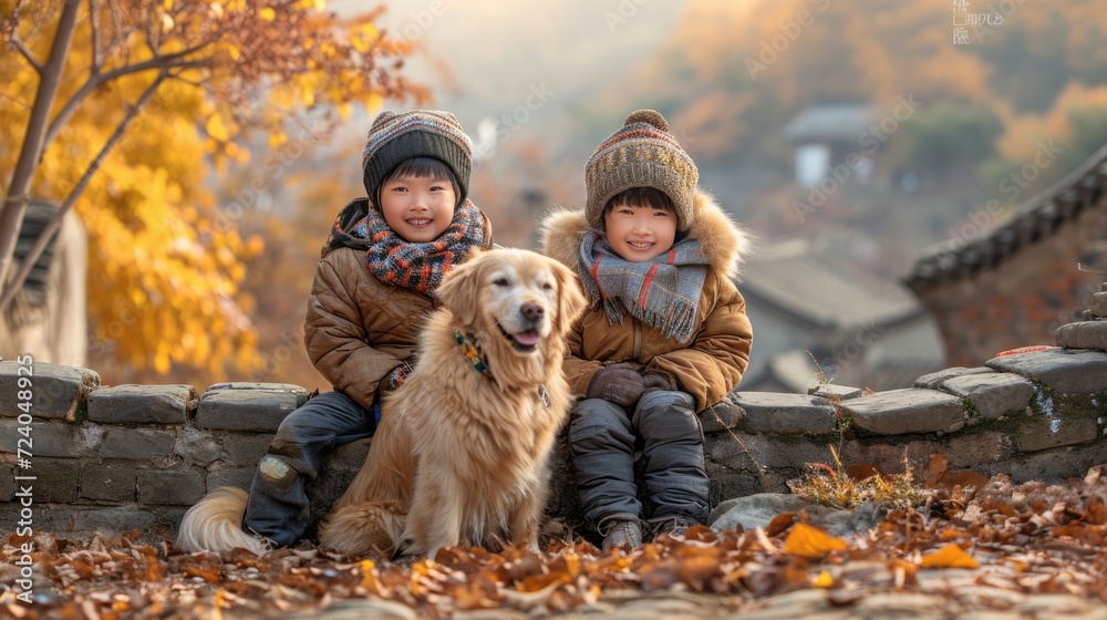 young little boys from rural China wearing autumn and winter clothes and a yellow dog waiting at the village entrance, happy time with best friend