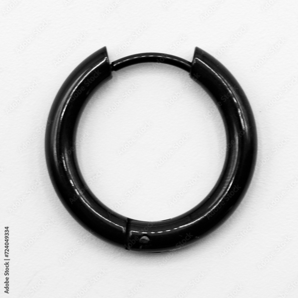 Fake hard earring. Black ear ring. Imitation jewelry. Accessory for rockers, rap, hip-hop, bikers, emo. Creation of a scenic view.  Pirate style.