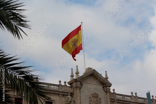 Spanish flag on top of a building. Barcelona, ​​Spain.
