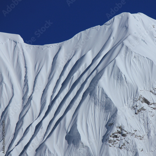 Beautiful textures on a snow covered mountain near Mount Everest, Nepal.