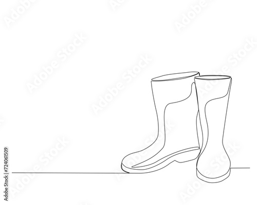 Continuous one line drawing of Gardener rubber boots. Rubber boots single outline vector illustration. Editable stroke.