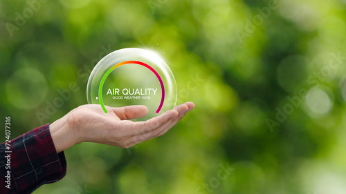 Good air quality and clean outdoor air quality Safe from pollution, PM 2.5 dust, pure natural atmosphere concept. hand with air bubbles, prevention of pollution, dust, bad air photo