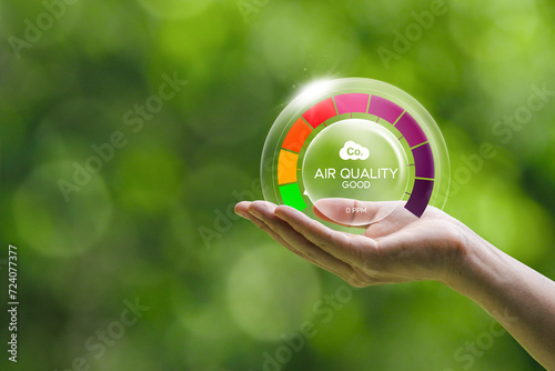 Good air quality and clean outdoor air quality Safe from pollution, PM 2.5 dust, pure natural atmosphere concept. hand with air bubbles, prevention of pollution, dust, bad air photo