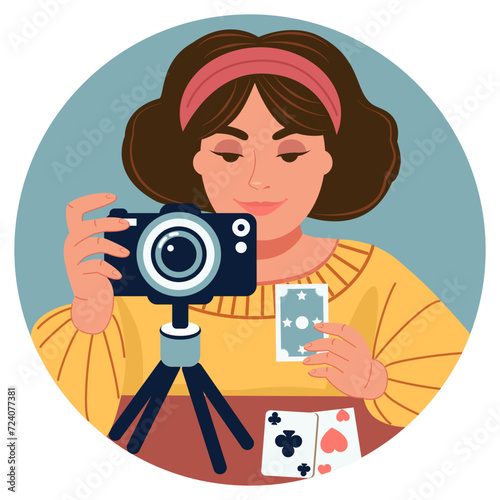 A female astrologer, Tarot card fortune teller and psychic videotapes her work with cards from the comfort of her home. The concept of this activity over the Internet.