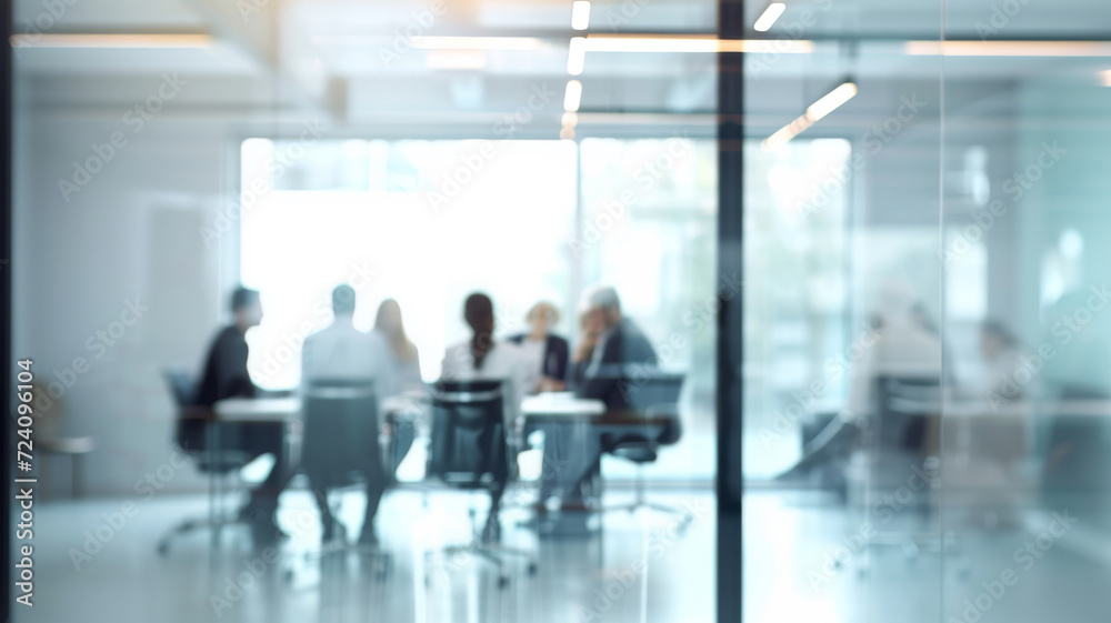 Blurred Bakcground View of a Business Team Meeting in a Modern Office