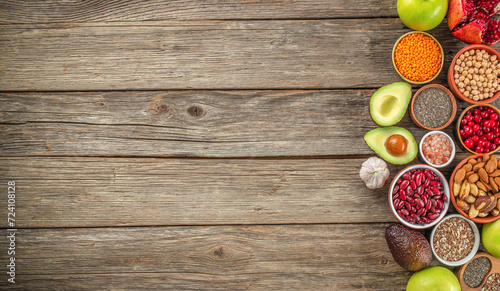 Set of vegetables, seeds and fruits on a wooden background. Detox and clean diet concept. top view. copy space