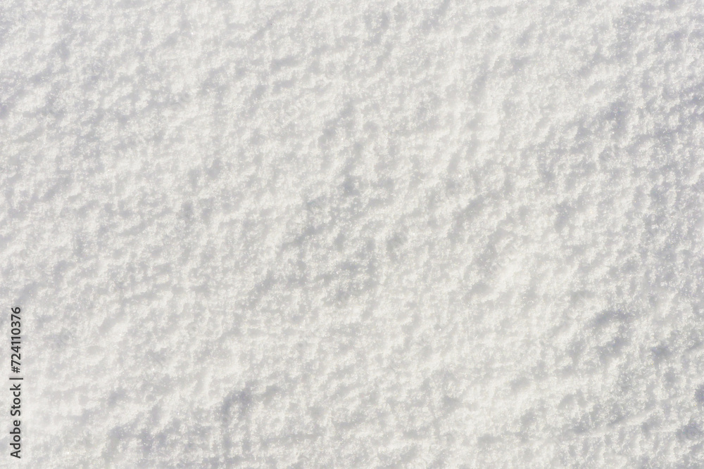 Abstract background from the surface of snow, top view.