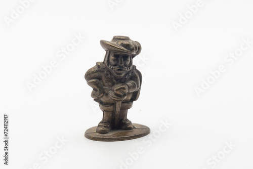 Small bronze figurine of a musketeer with a hat