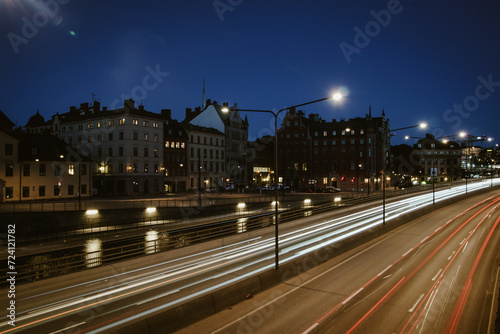 a view of a city street filled with traffic at night © niklas storm