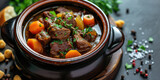 Savory Beef Stew with Potatoes and Carrots. Rich beef stew with tender chunks of meat, potatoes, and carrots, garnished with fresh thyme.