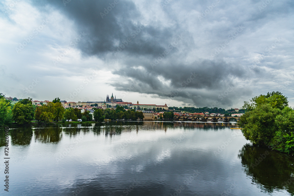 Naklejka premium Stormy Skies Over Prague's Vltava River