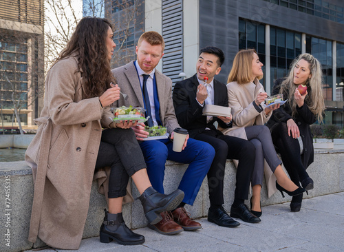 group business office people eating salad healthy life