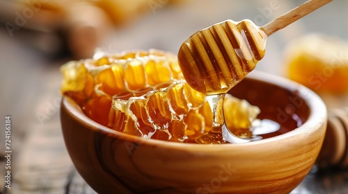 honey with a honey stick in the wooden bowl closeup, honey banner, honey background, honey ads, honey, healthy food concept, honey stick, and wooden bowl closeup, honey bowl closeup